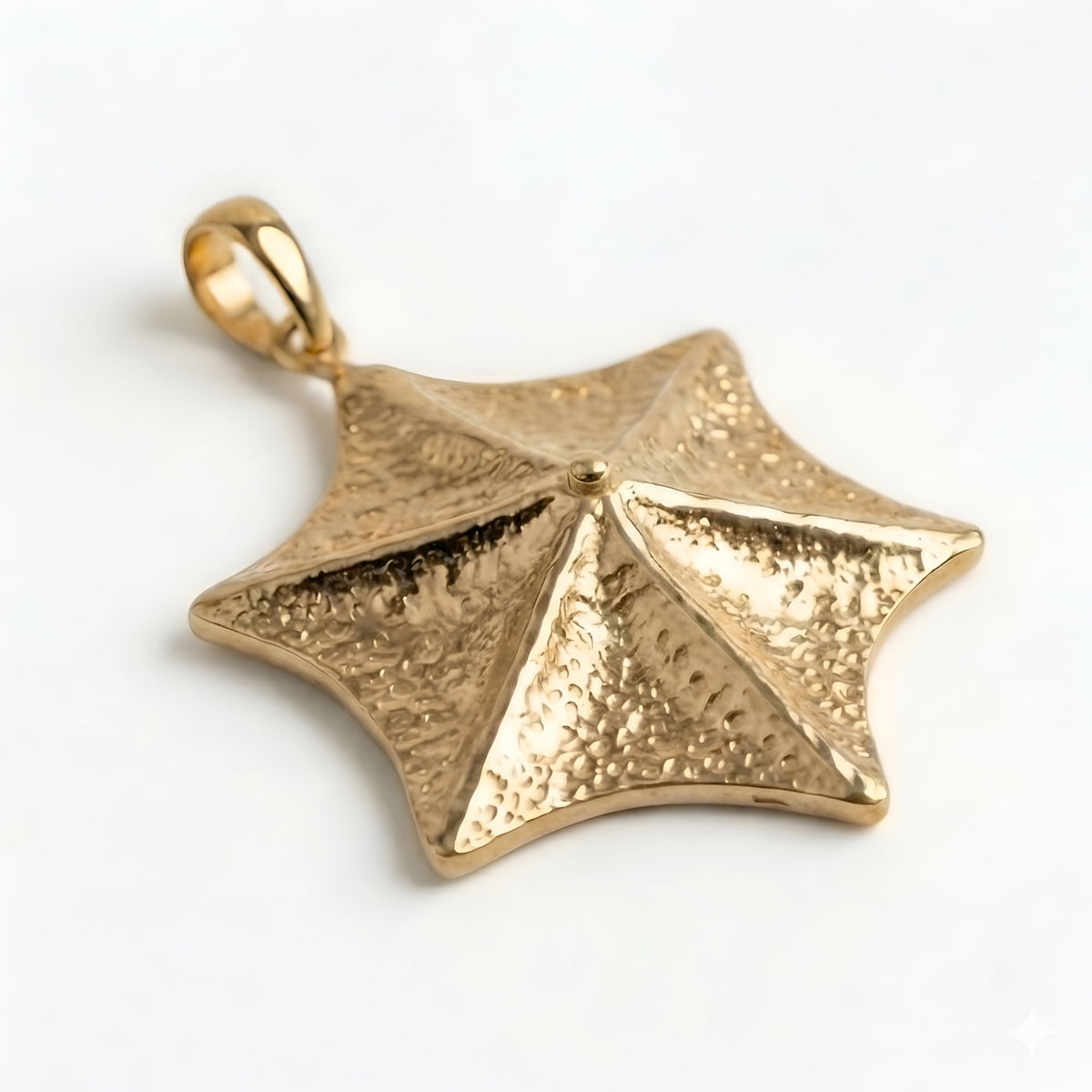 The Polaris Charm: Hammered Star Charm