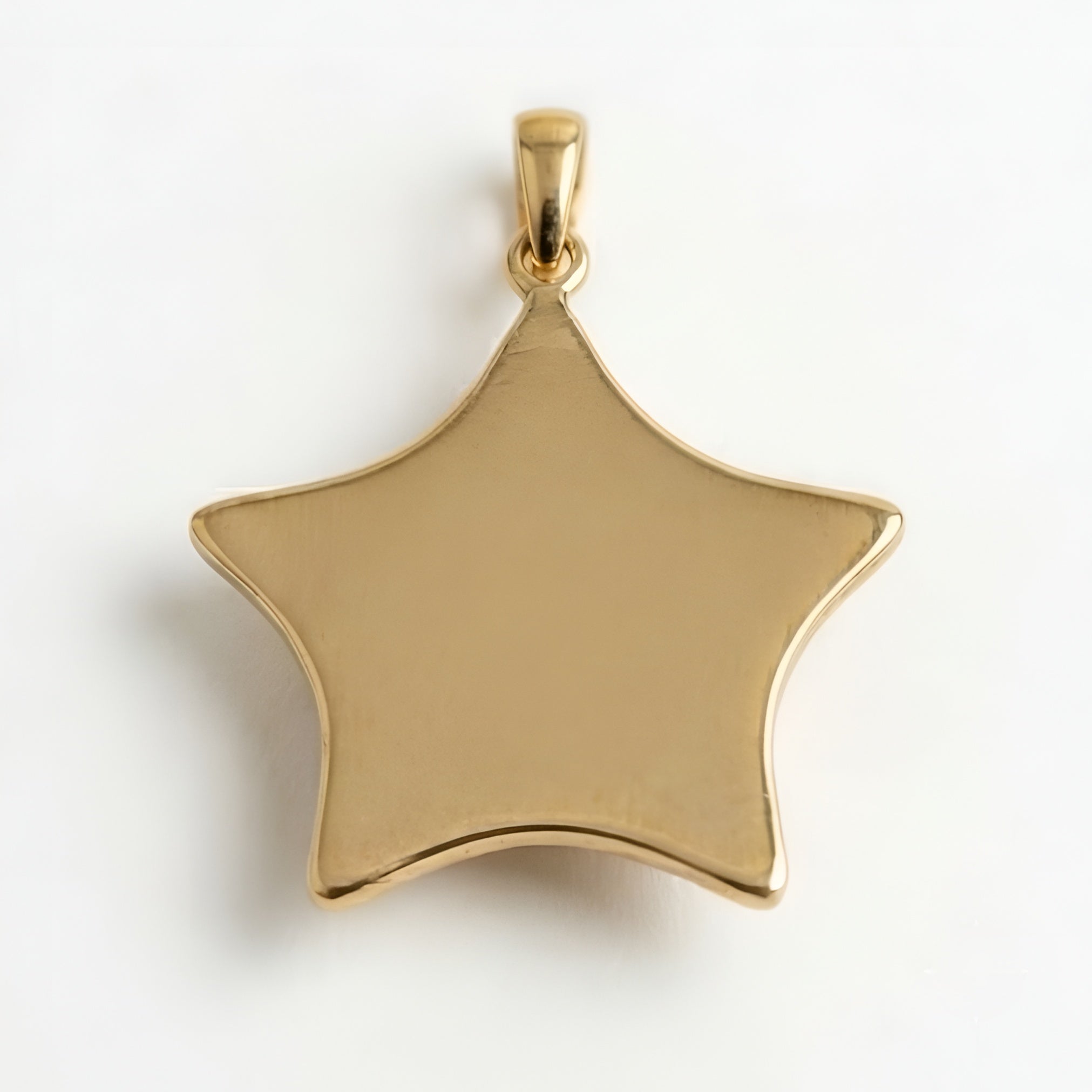 The Polaris Charm: Hammered Star Charm