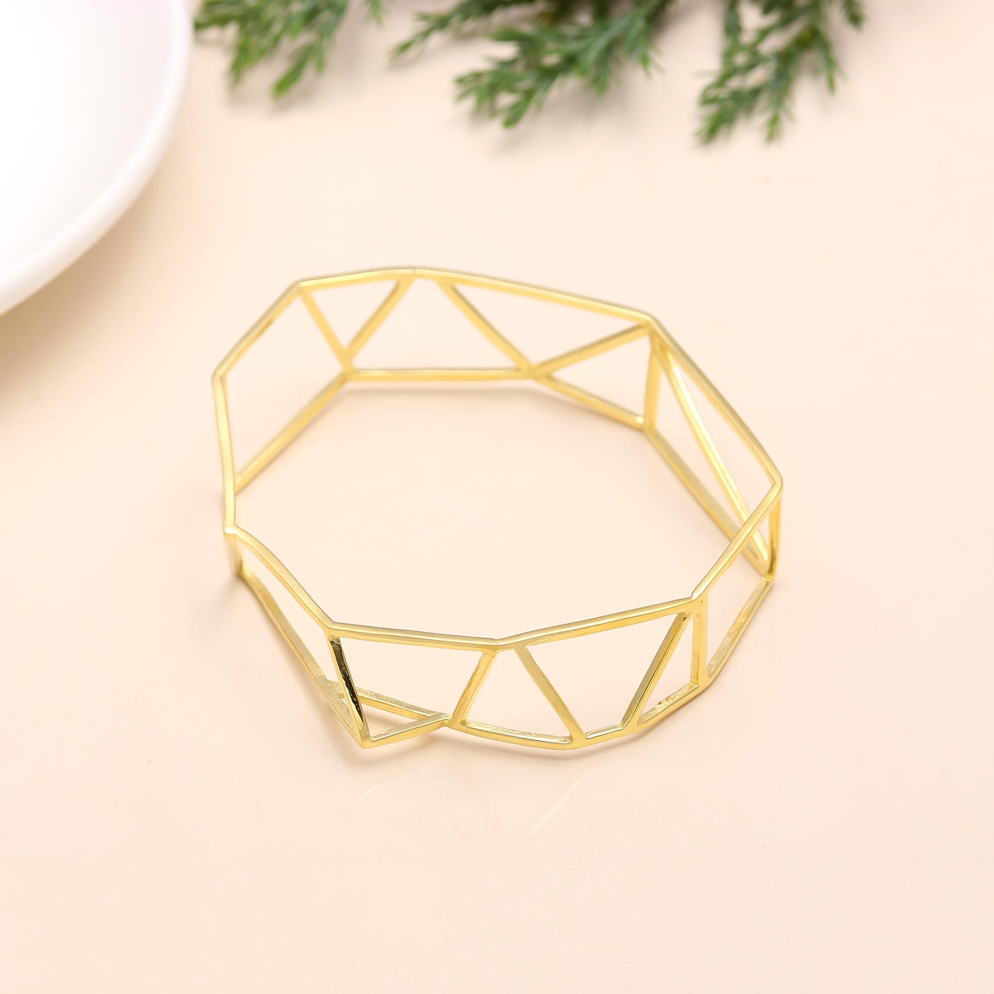 The Faceted Framework: Geometric Gold Bangle