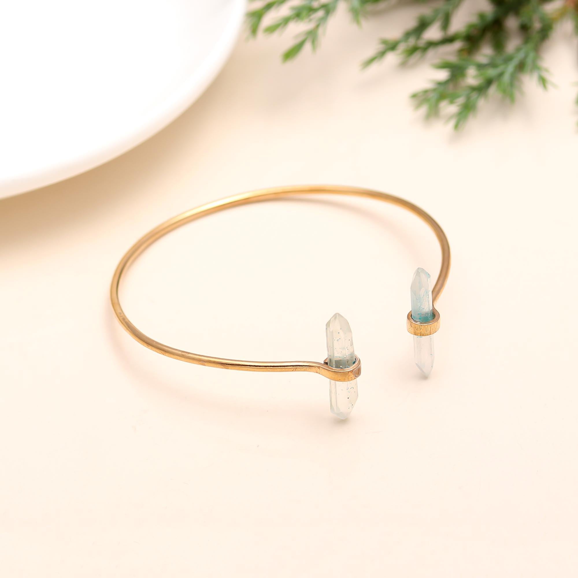 The Crystal Gateway: Gold Quartz Point Cuff