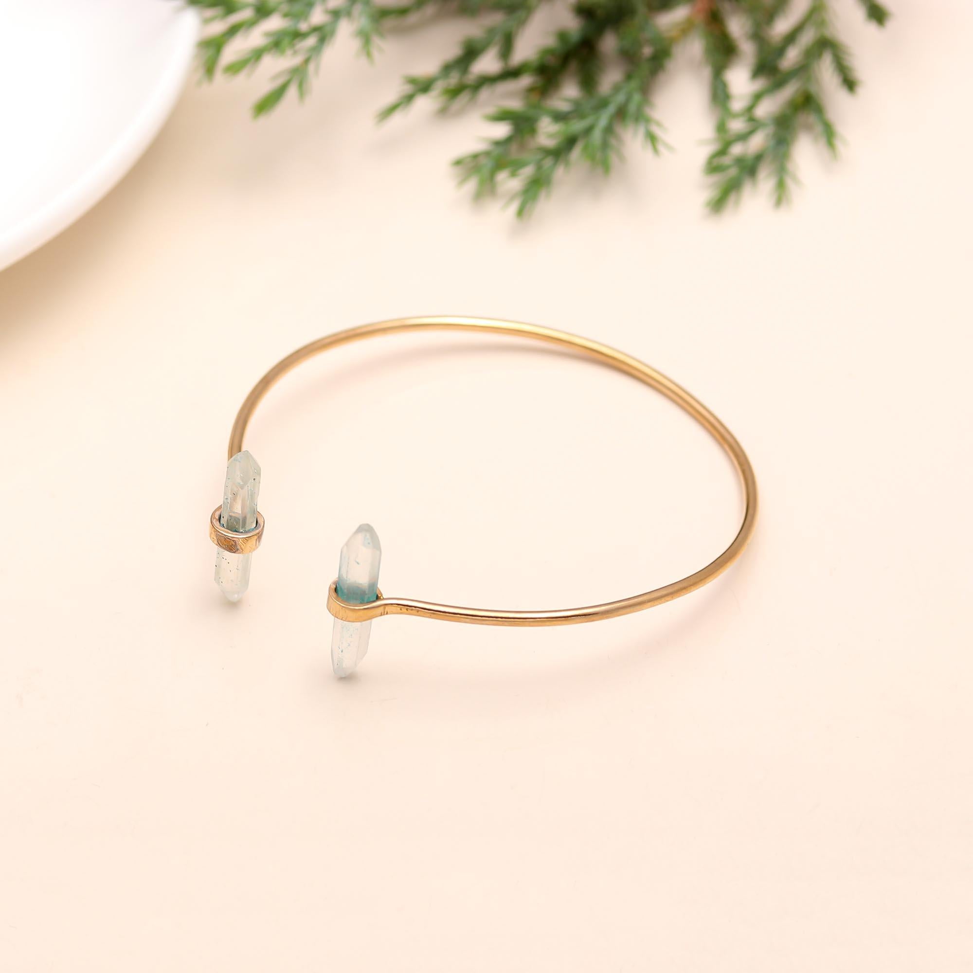 The Crystal Gateway: Gold Quartz Point Cuff