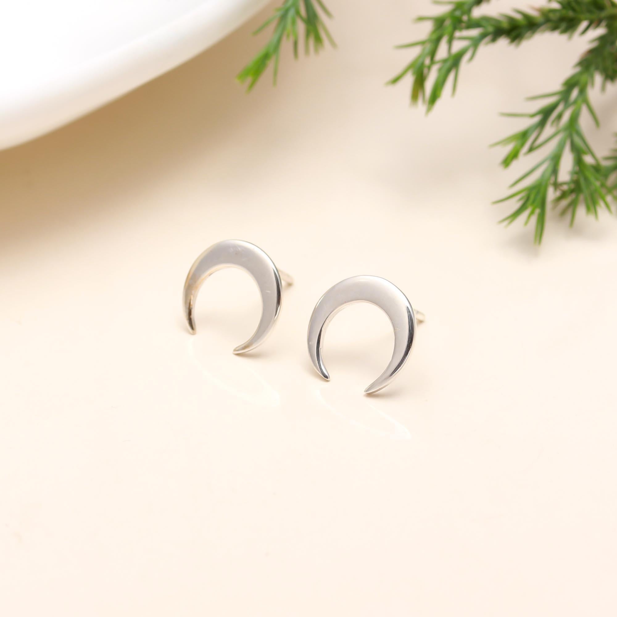 The Lunar Silhouette: Silver Crescent Moon Stud Earrings