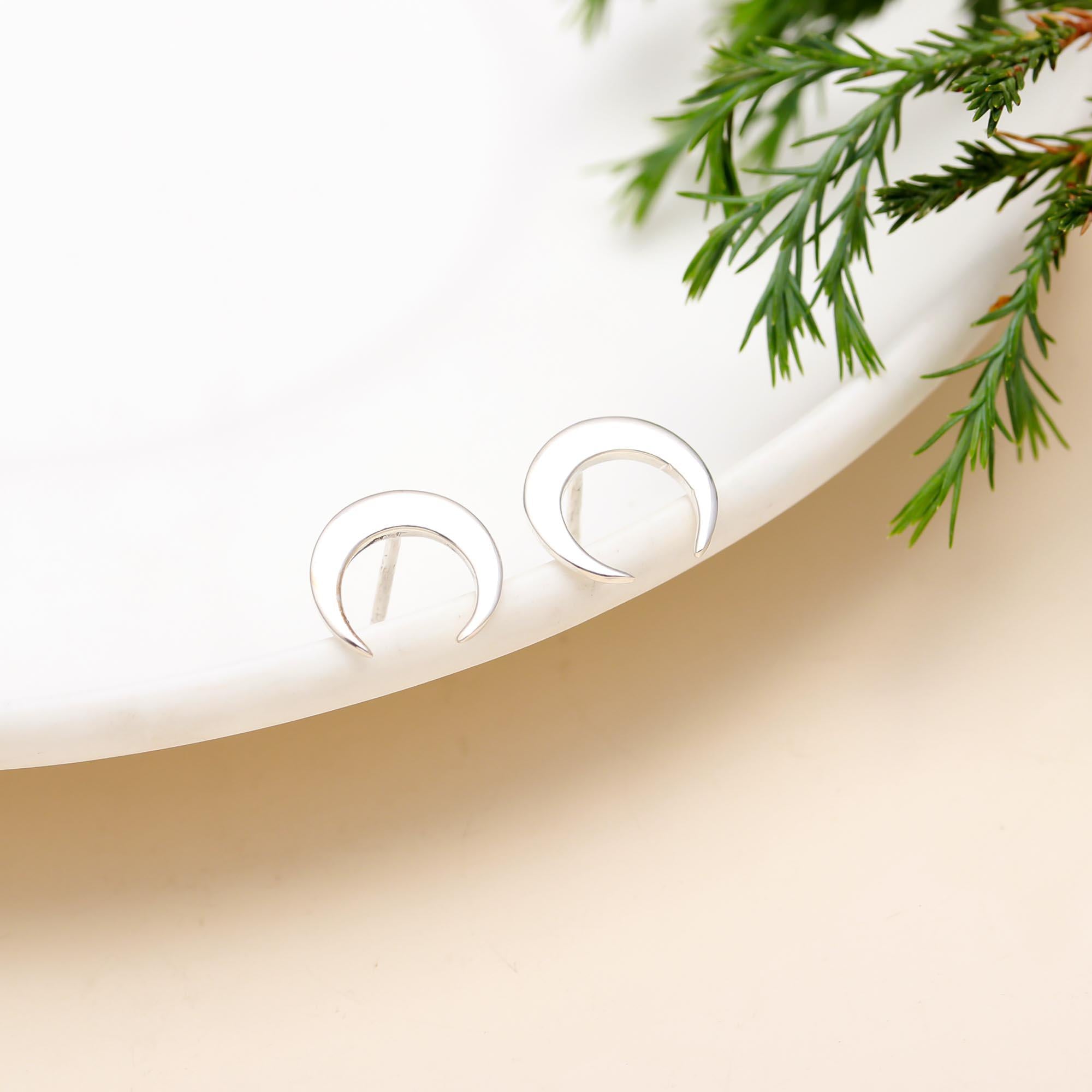 The Lunar Silhouette: Silver Crescent Moon Stud Earrings