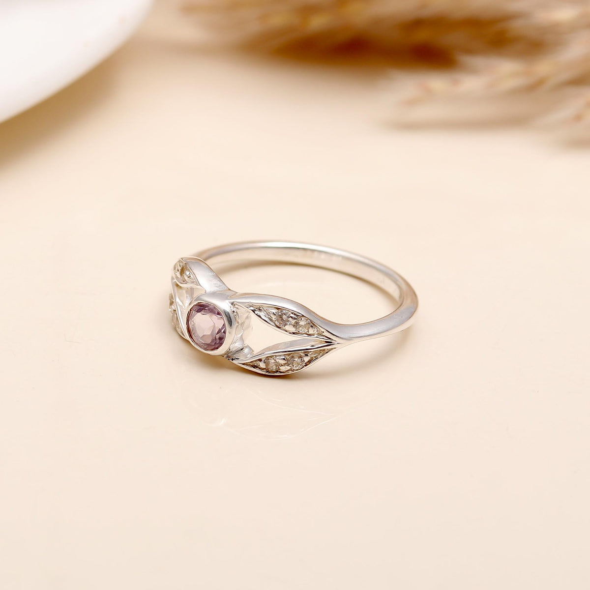 Leaf design silver band with purple round amethyst