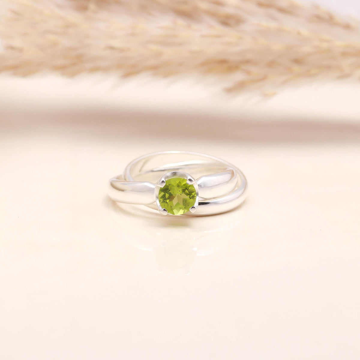 The Verde Crown: Round Peridot High-Set Ring