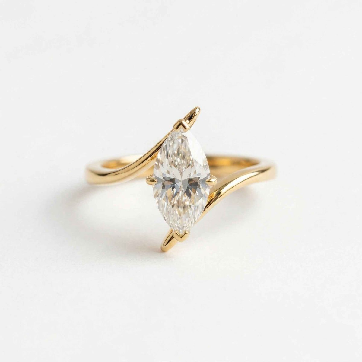 The Marquise Wave: Solitaire Moissanite Bypass Engagement Ring