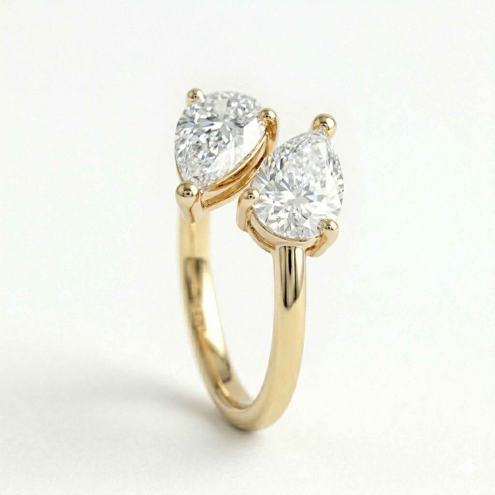 The Toi et Moi: Dual Pear Moissanite Gold Bypass Ring