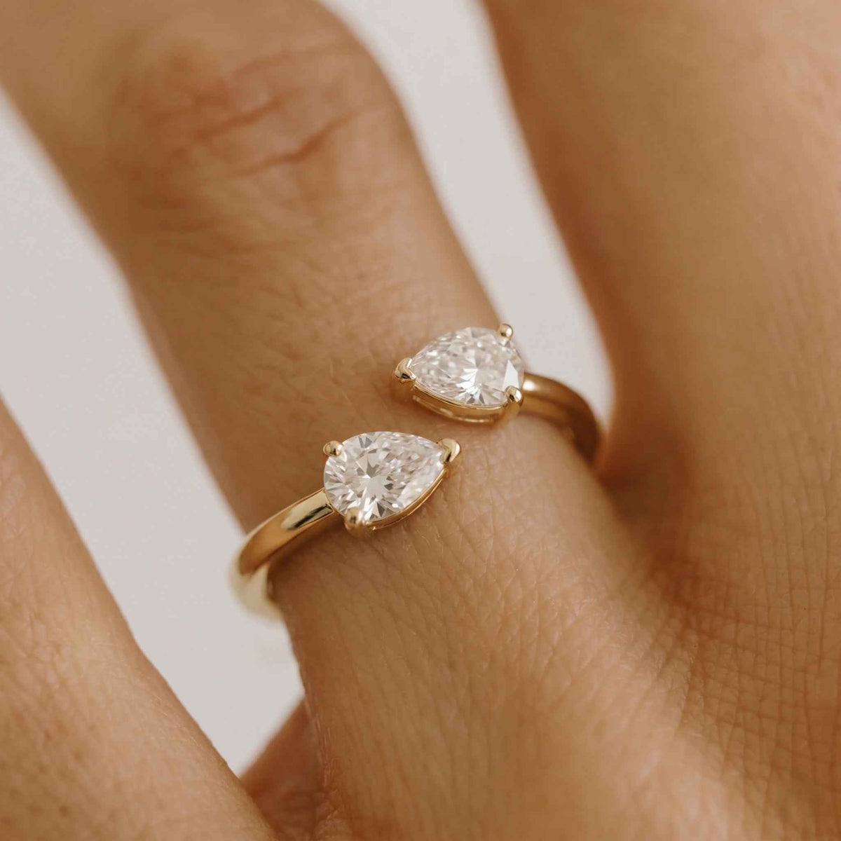 The Toi et Moi: Dual Pear Moissanite Gold Bypass Ring