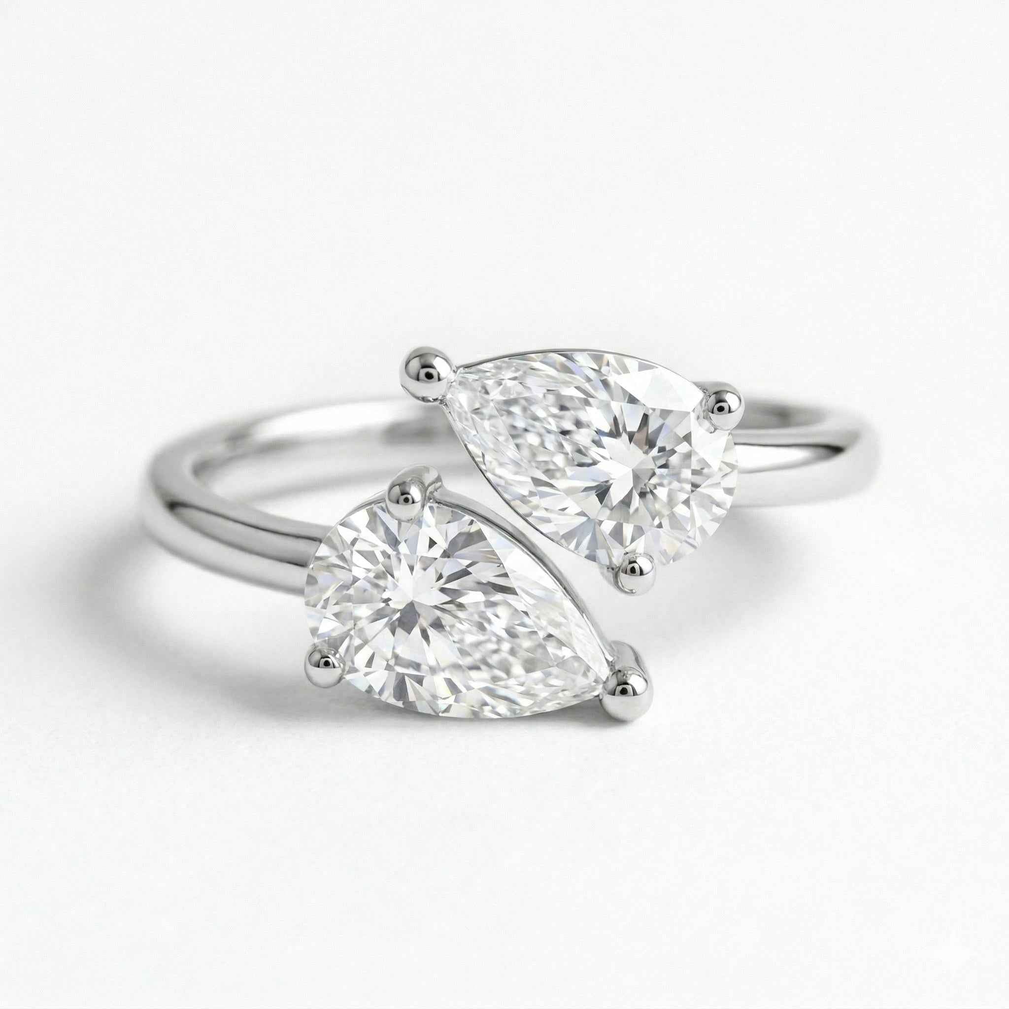 The Toi et Moi: Dual Pear Moissanite Gold Bypass Ring