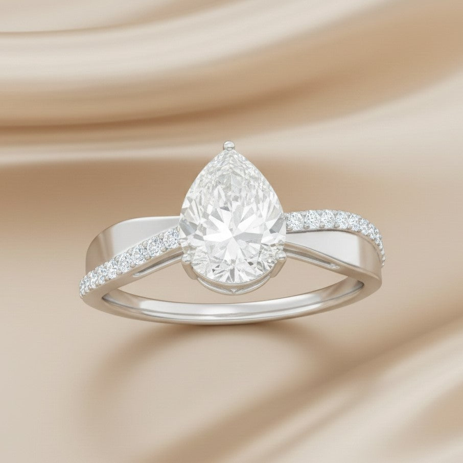 The Graceful Ribbon: 1.20ct Pear Moissanite Bypass Engagement Ring