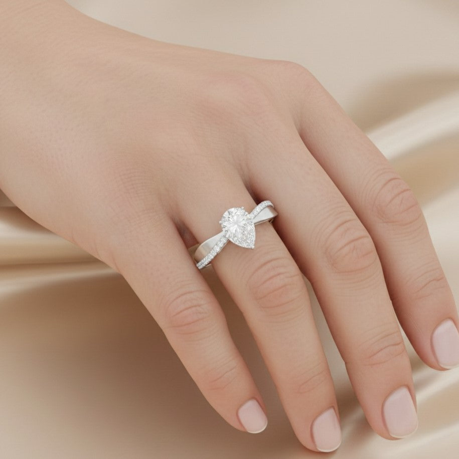 The Graceful Ribbon: 1.20ct Pear Moissanite Bypass Engagement Ring