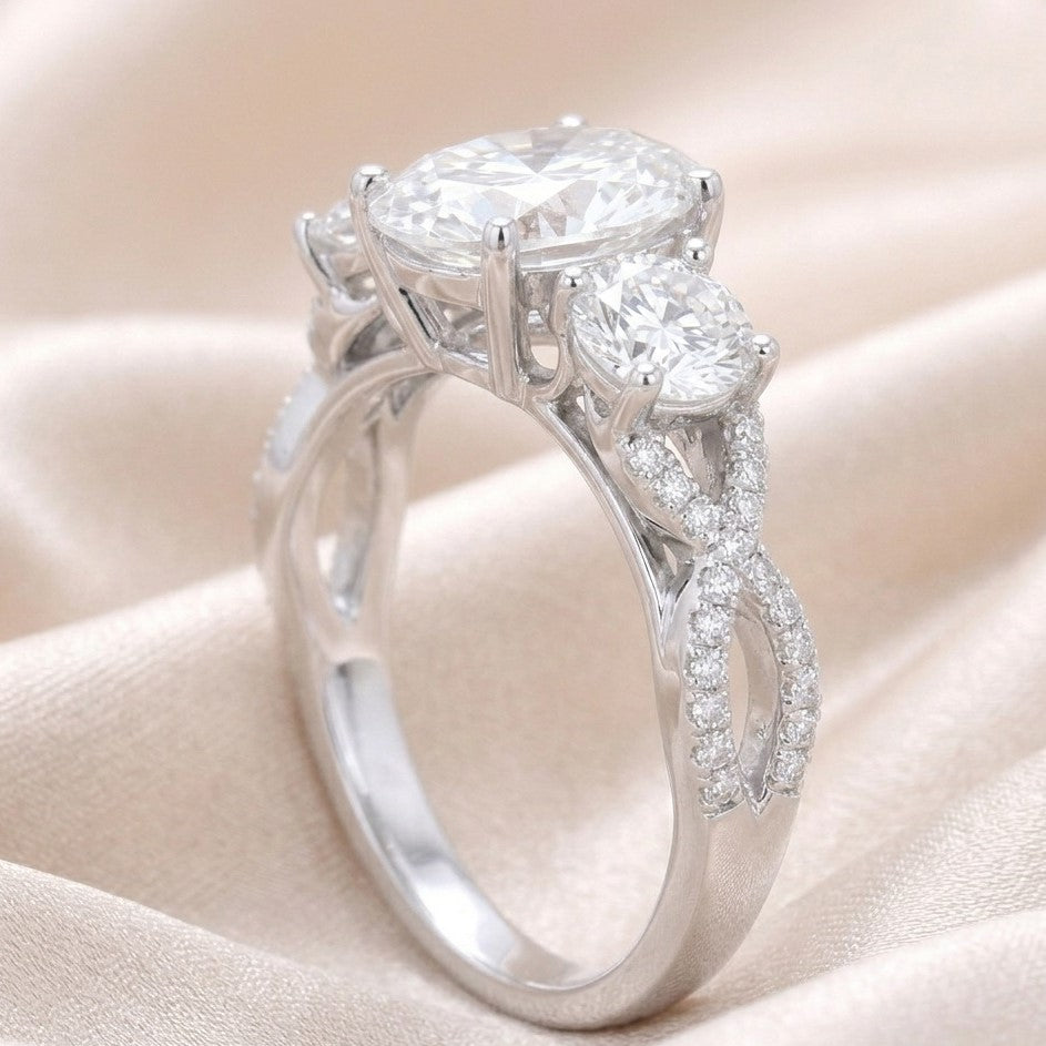 The Infinity Trinity: 2.50ct Oval Moissanite 3-Stone Twist Ring