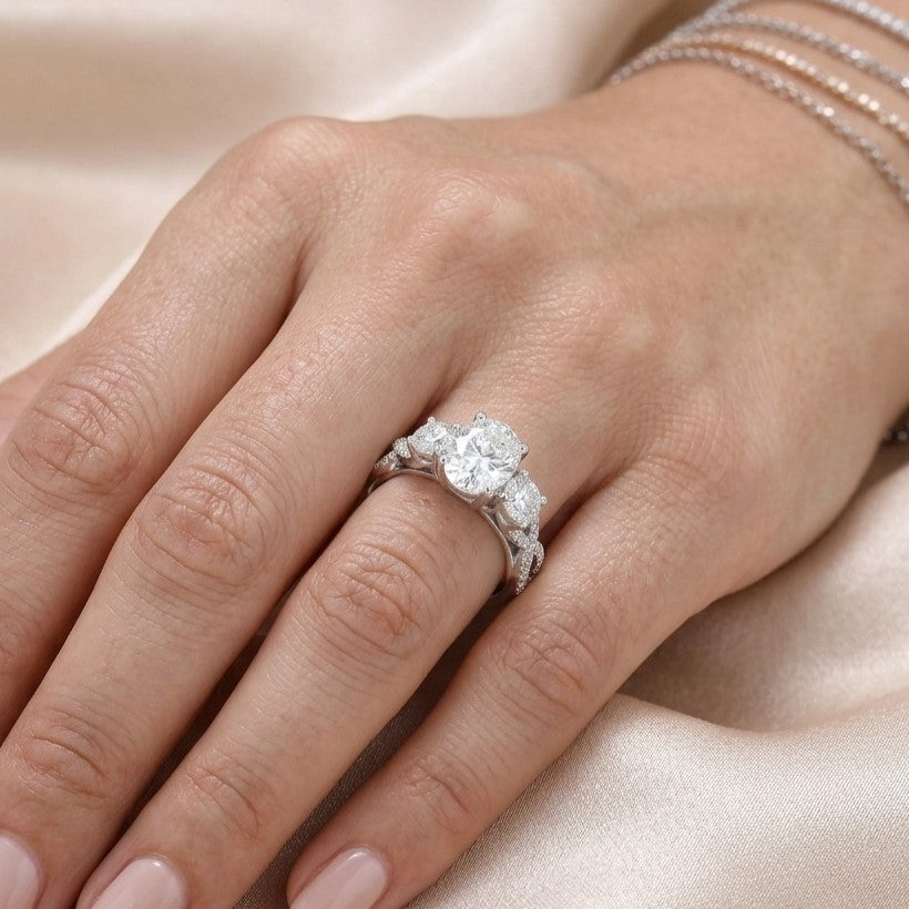 The Infinity Trinity: 2.50ct Oval Moissanite 3-Stone Twist Ring