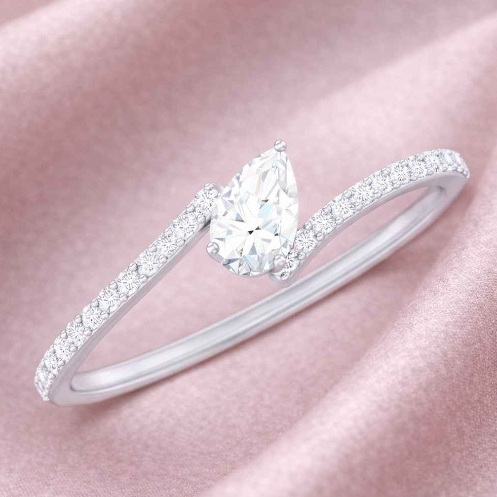 The Asymmetric Grace: Pear-Cut Moissanite Engagement Ring