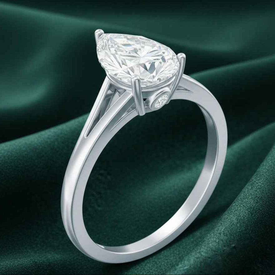 The Radiant Pear Solitaire: Sculptural Moissanite Engagement Ring