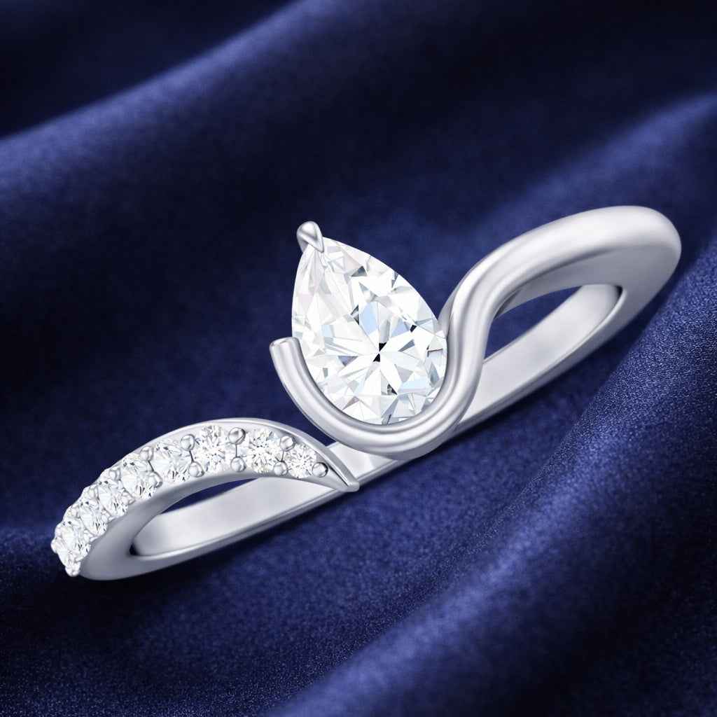The Fluid Pear: Contemporary Bypass Moissanite Ring
