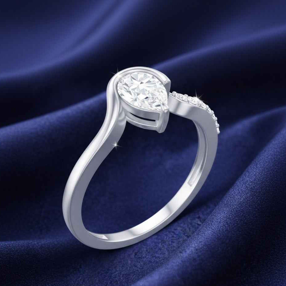 The Fluid Pear: Contemporary Bypass Moissanite Ring
